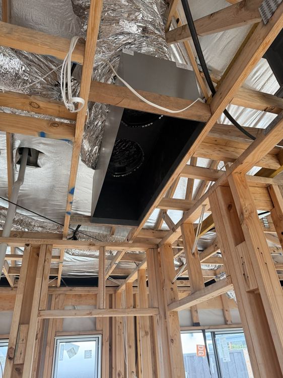 Ceiling services and framing recorded before plasterboard installation.